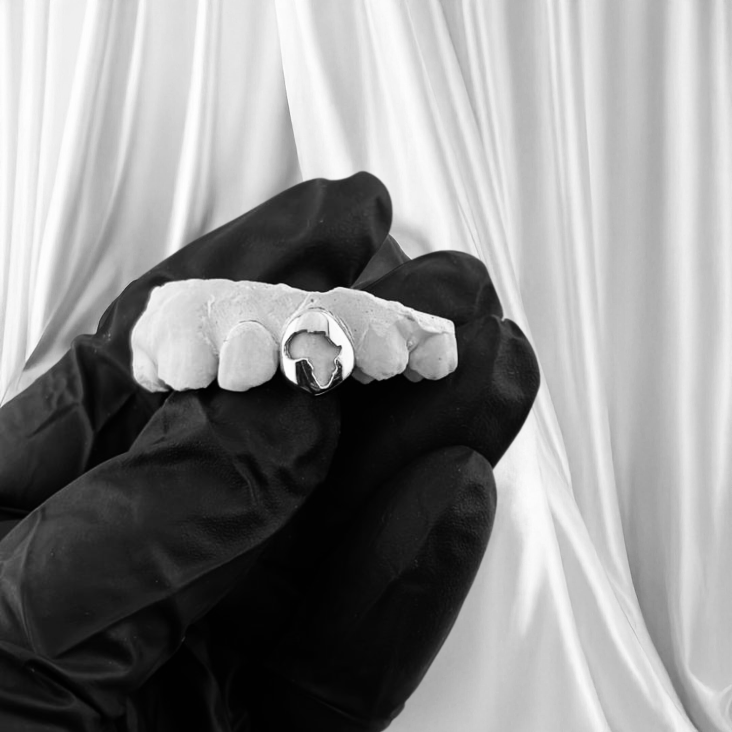 ORIGYN (SILVER GRILLZ)